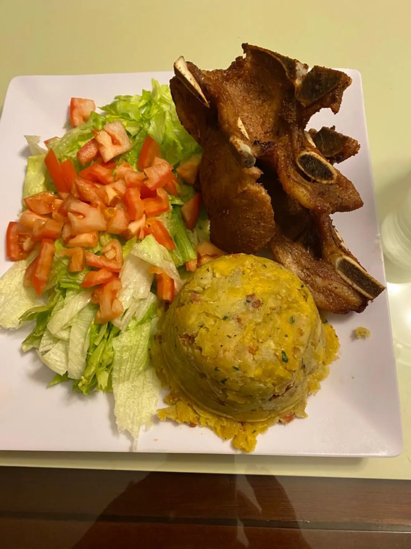 Mofongo served with a pork chop