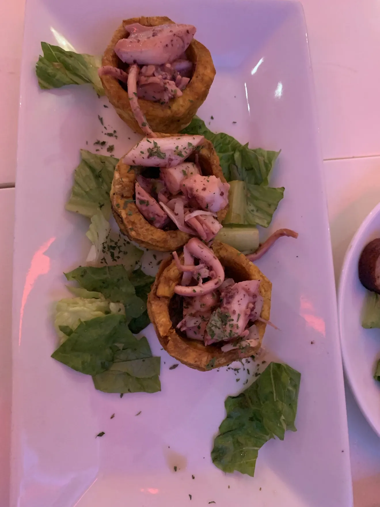 Tostones filled with octopus