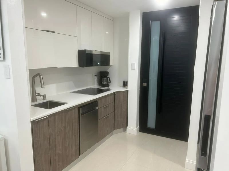 Maréa galley kitchen and entry hall