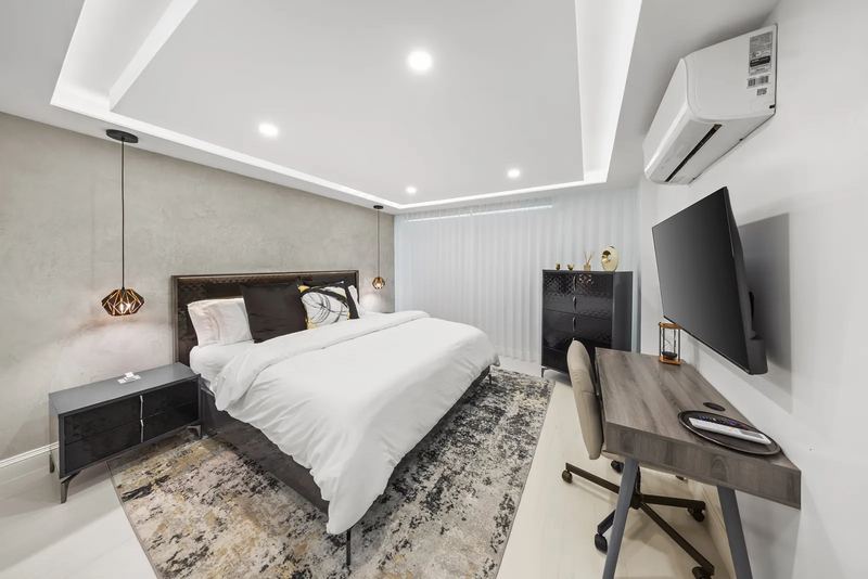 Terra Noir king bed with dark accent wall