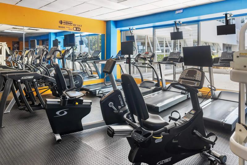 Building fitness room with cardio equipment